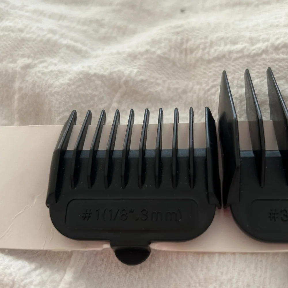 Brand new extra clipper combs, various sizes, see photos